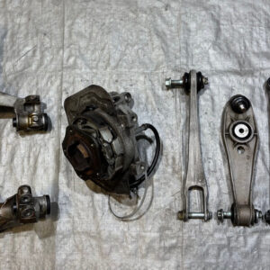 1999-2004 Porsche 996 911 Driver Rear Spindle Hub w/ Control Arms / Subframe Bracket / 88K P6019